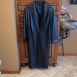Full length black leather coat. Good condition.